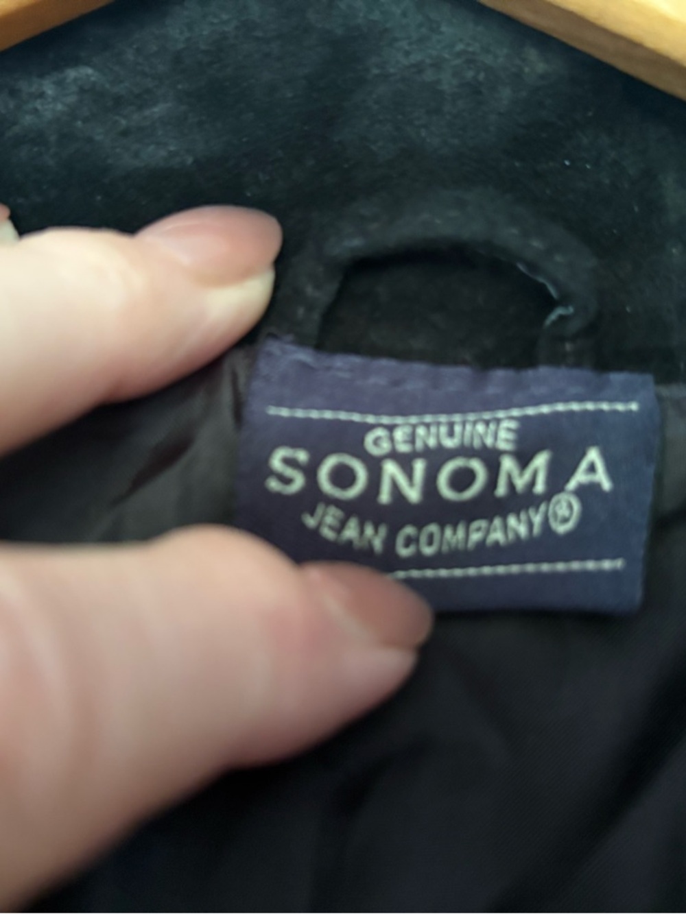 Sonoma navy fabric label with cream text stitching